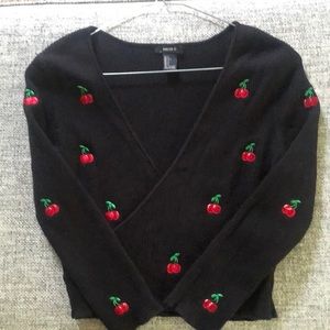 Black wrap top with cherry details